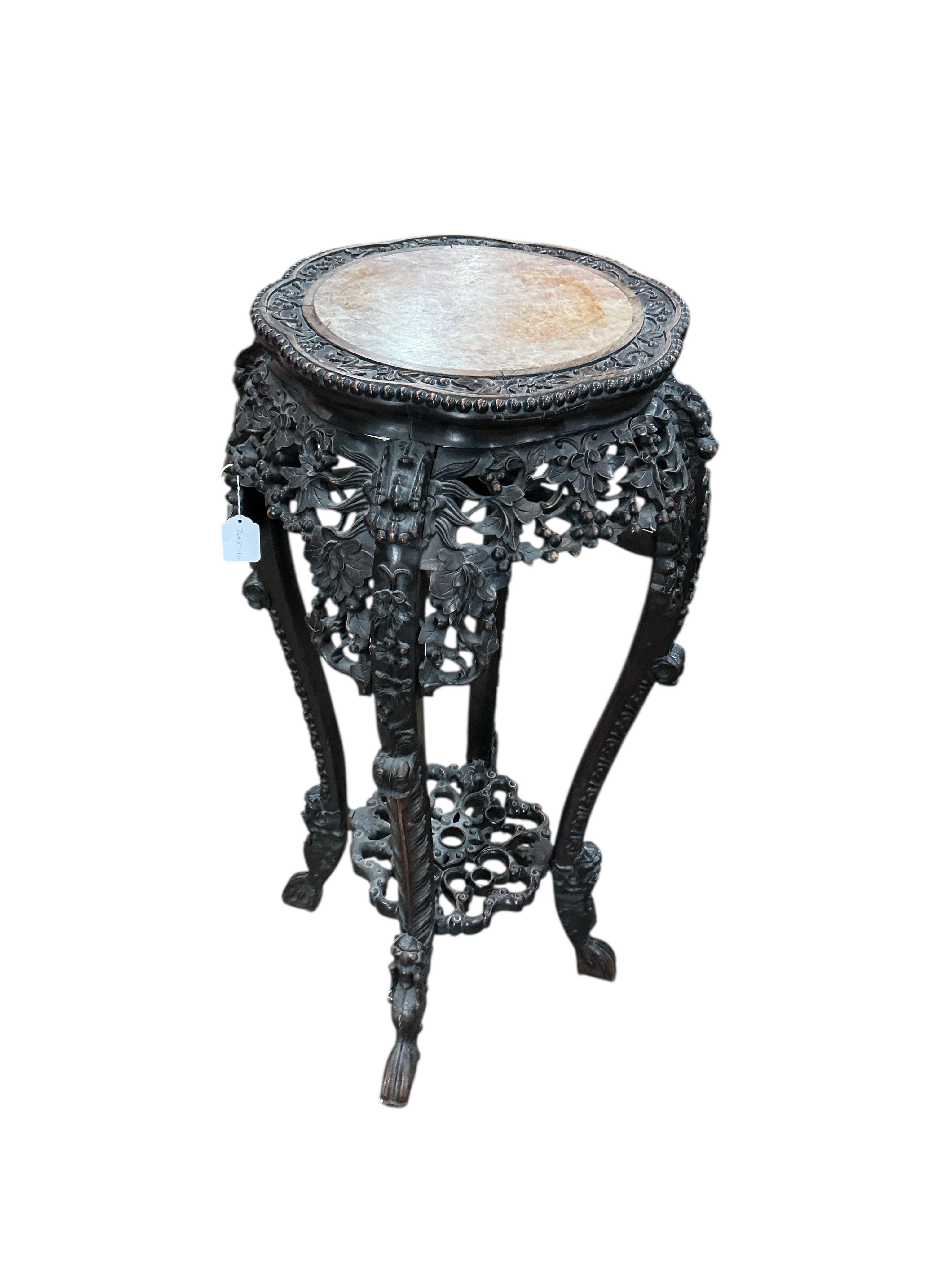 A Chinese carved hongmu rouge marble topped vase stand, diameter 42cm, height 93cm